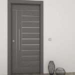 Puerta exterior con duelas